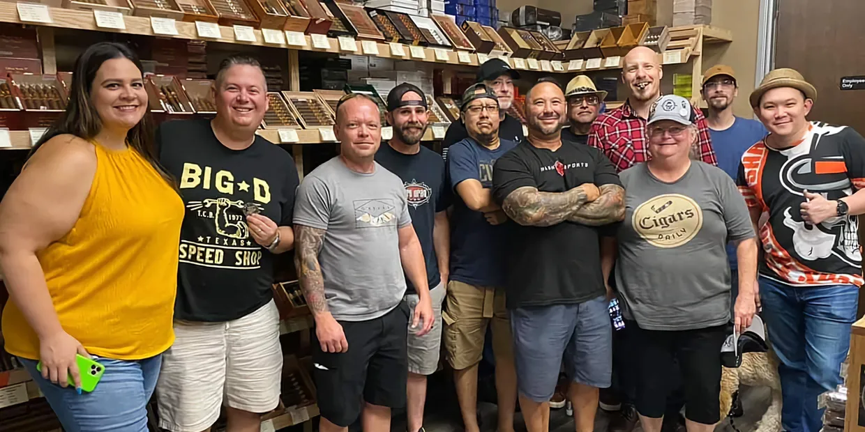 Group of Legion members inside a cigar shop humidor